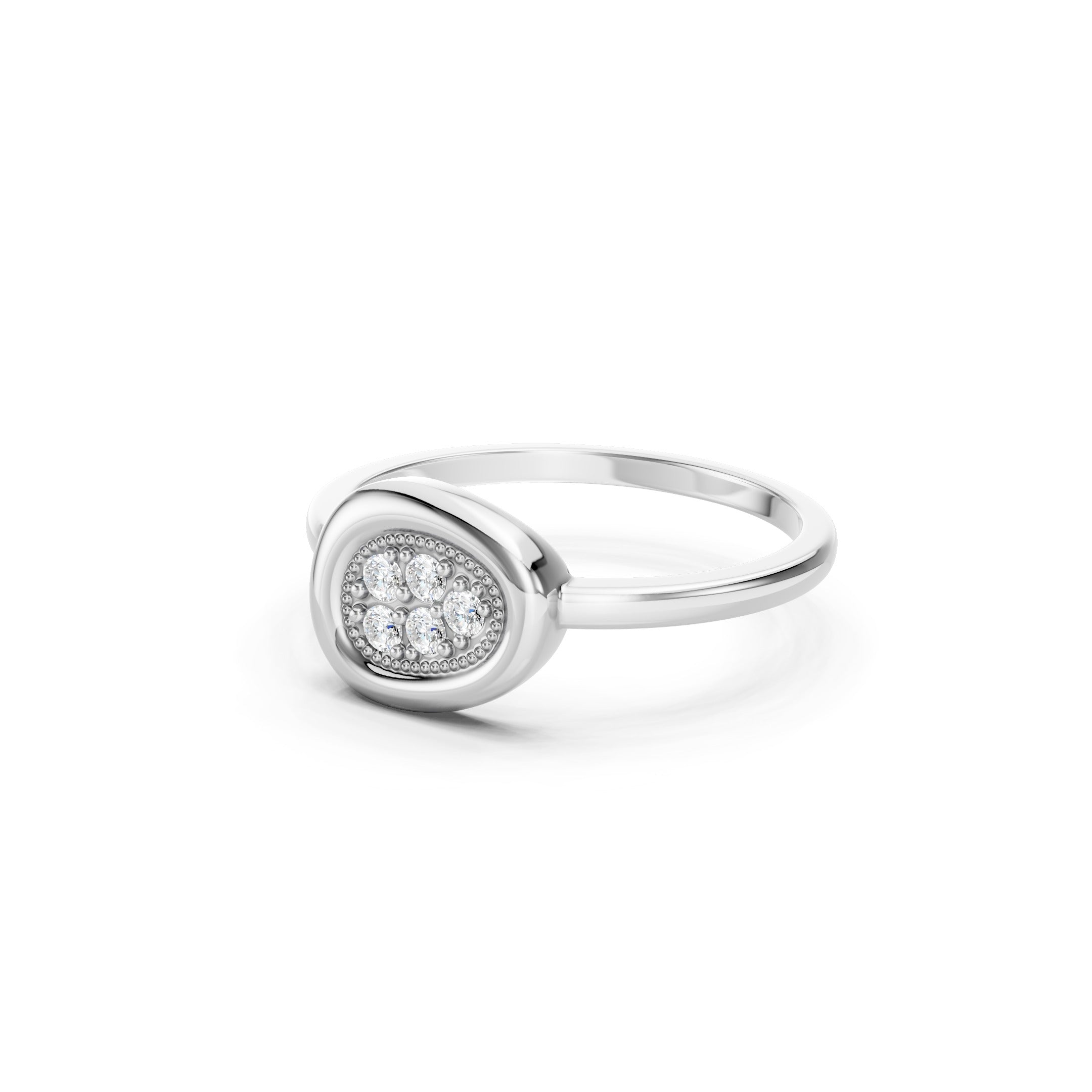 Side-angle view of a white gold oval cluster diamond ring with five sparkling round-cut diamonds, a raised beaded bezel setting, and a slim polished gold band.