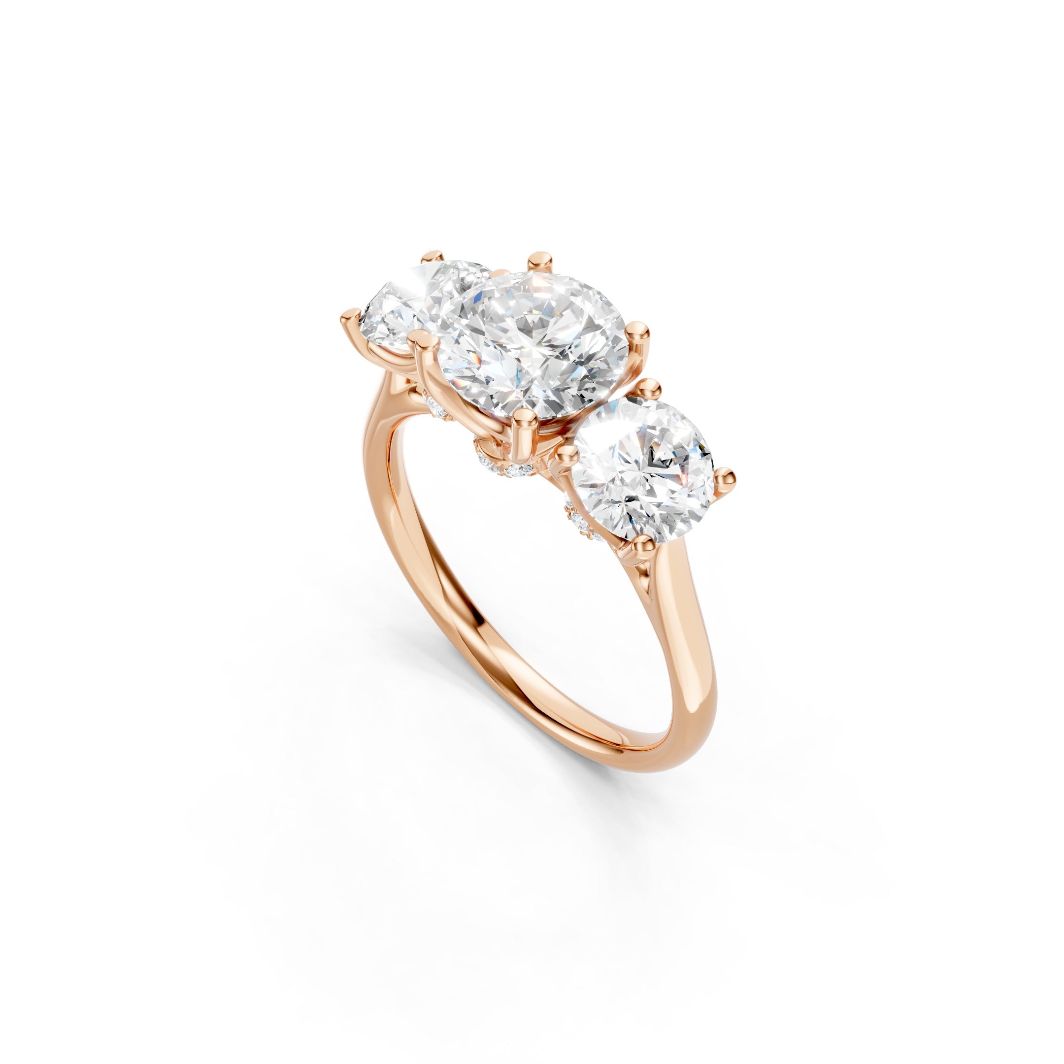 rose gold three stone diamond engagement ring showcasing three sparkling round diamonds, elevated prong settings, and a polished gold band.