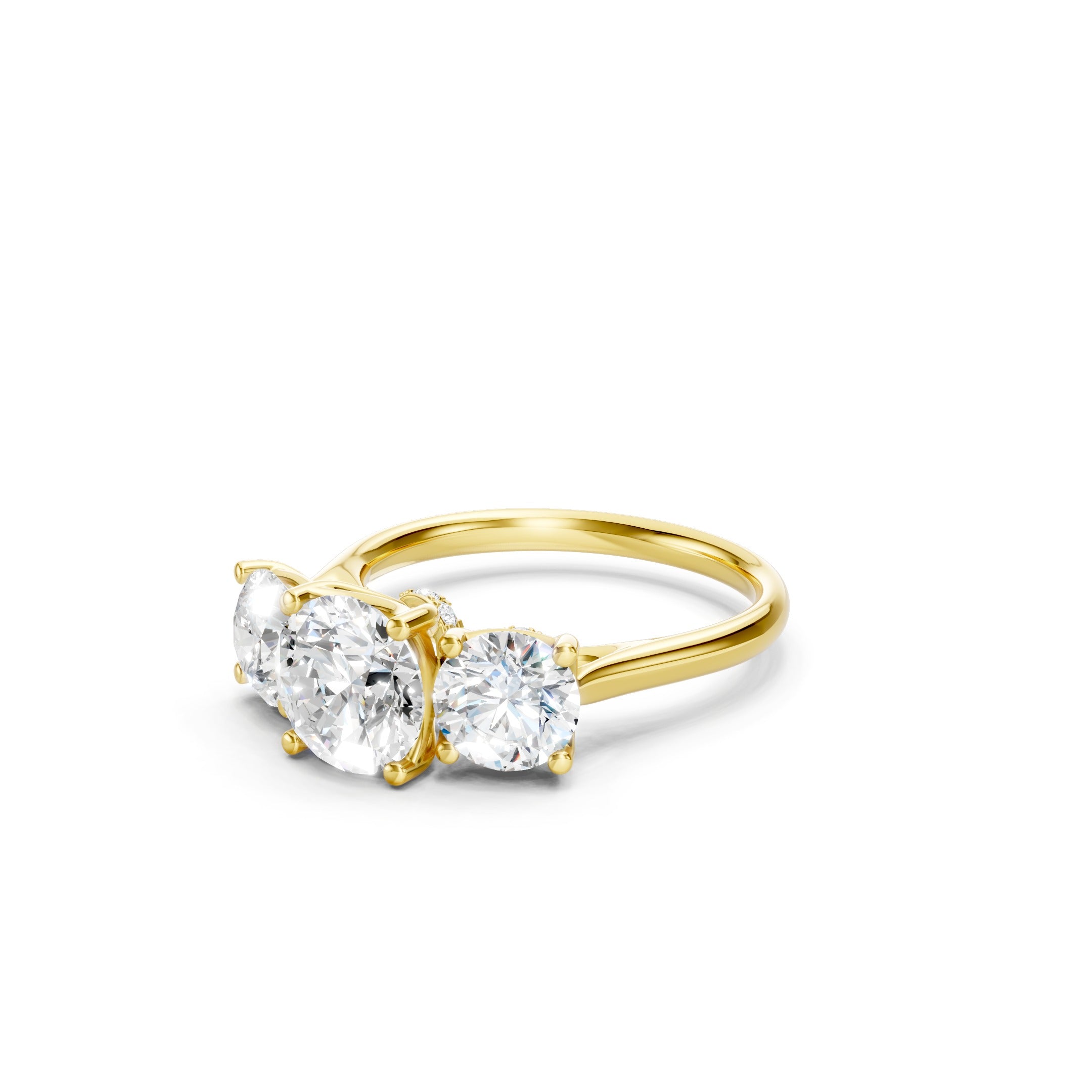 Yellow gold three stone lab grown diamond engagement ring with round cut center diamond and matching side stones in a classic prong setting.