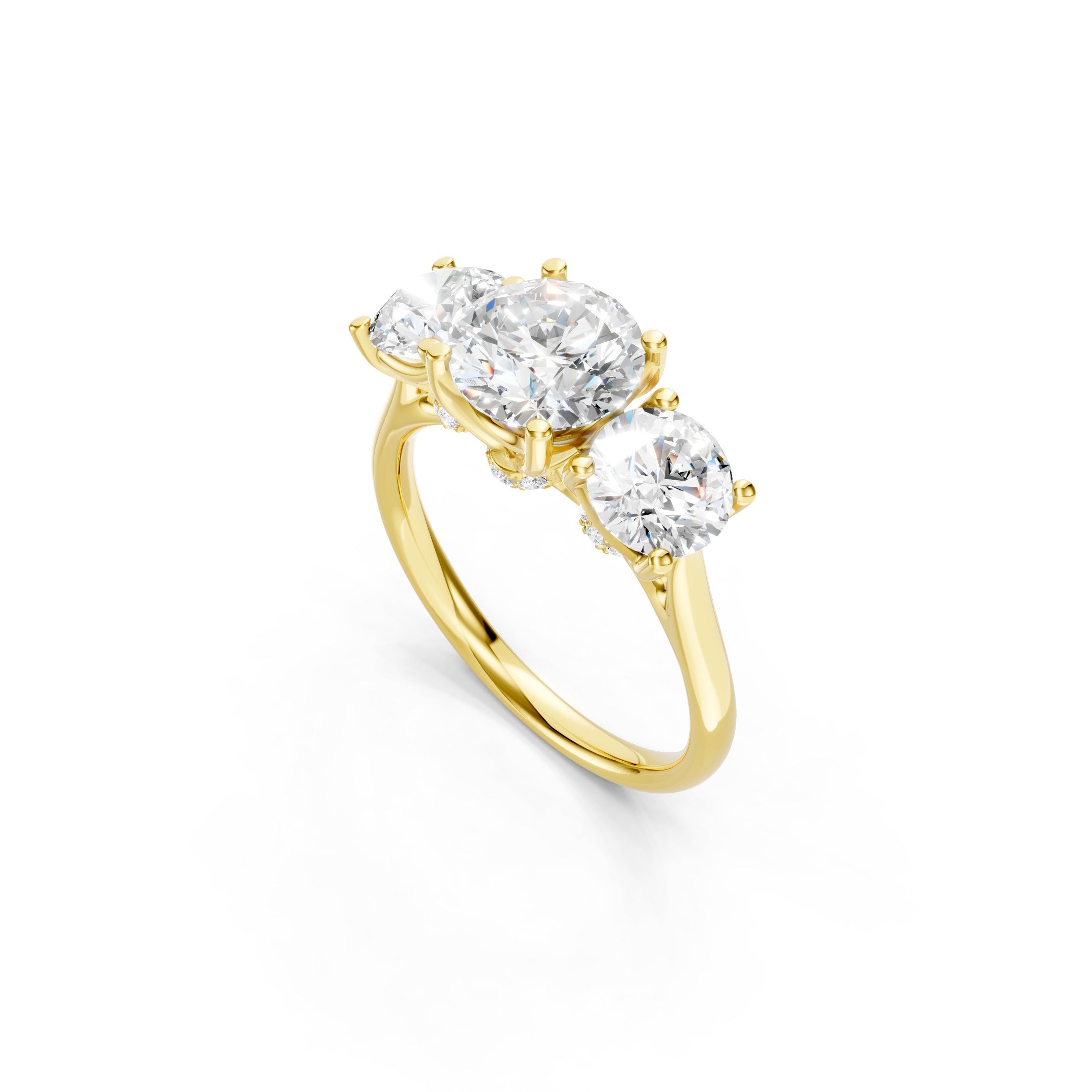 solid yellow gold three stone diamond ring featuring a large round center diamond, two round side diamonds, and elegant prong settings.