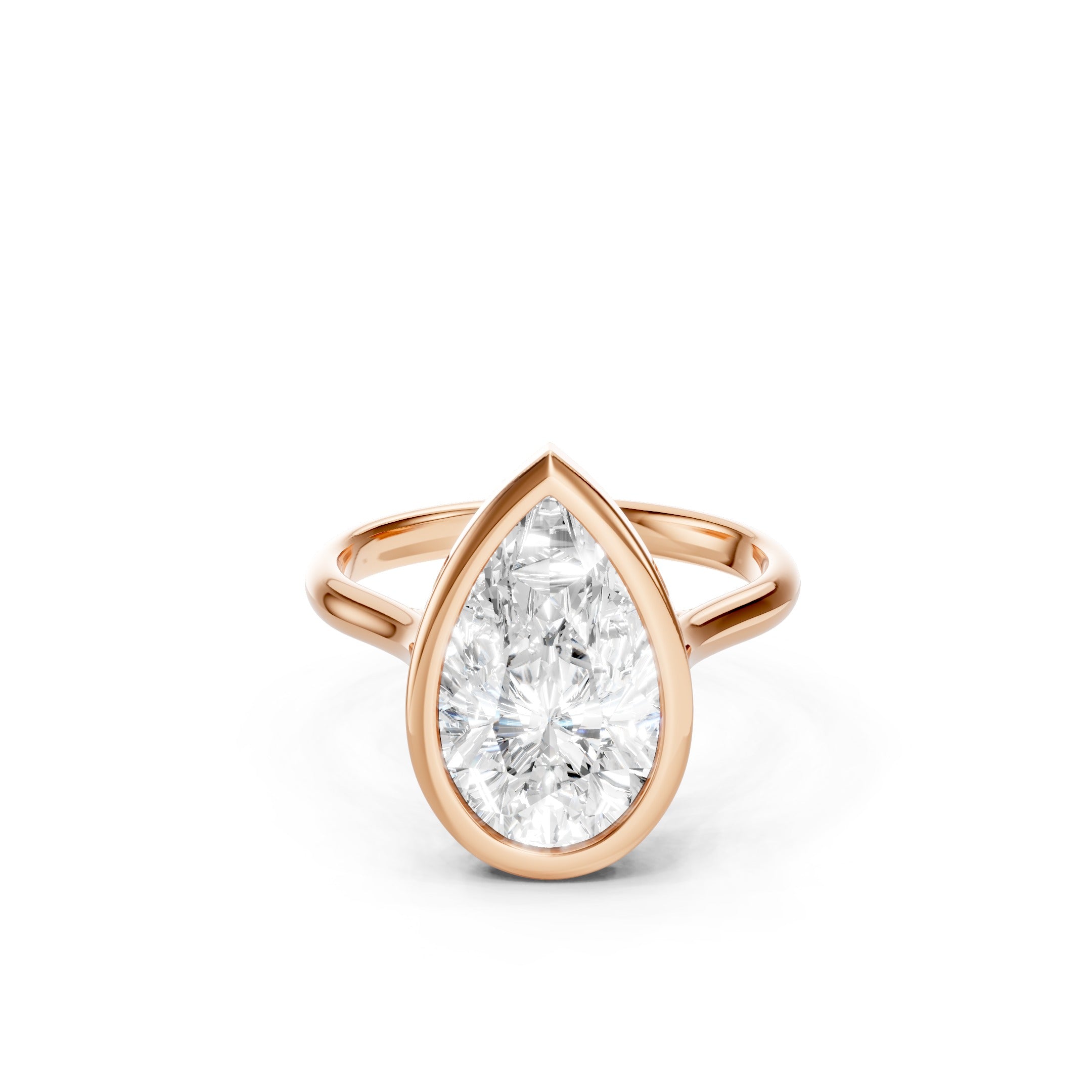 Pear Cut Lab Grown Diamond Engagement Ring in 14K Rose Gold, Elegant Bezel Set Solitaire Ring with a Sleek Polished Band.