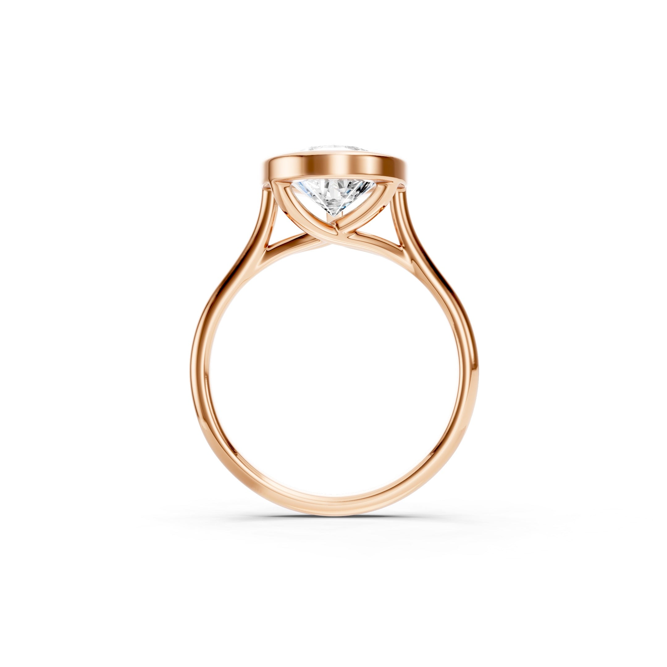 Pear Cut Lab Grown Diamond Engagement Ring in 14K Rose Gold, Elegant Bezel Set Solitaire Ring with a Sleek Polished Band.